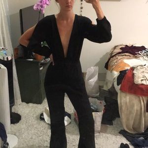 Sophisticated black jumpsuit with tie